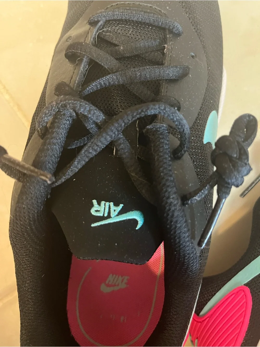Nike Women's Black Mesh Athletic Sneakers with Teal and Pink Accents